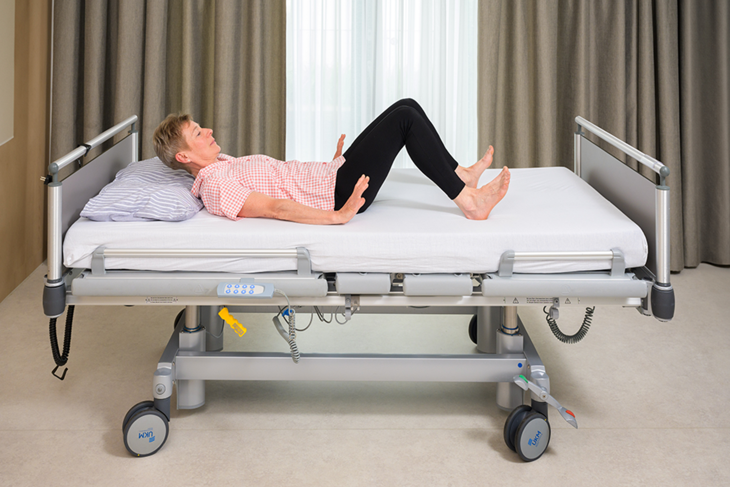 UKM Service | Bewegung im Krankenhaus | Patientin in Grundspannung