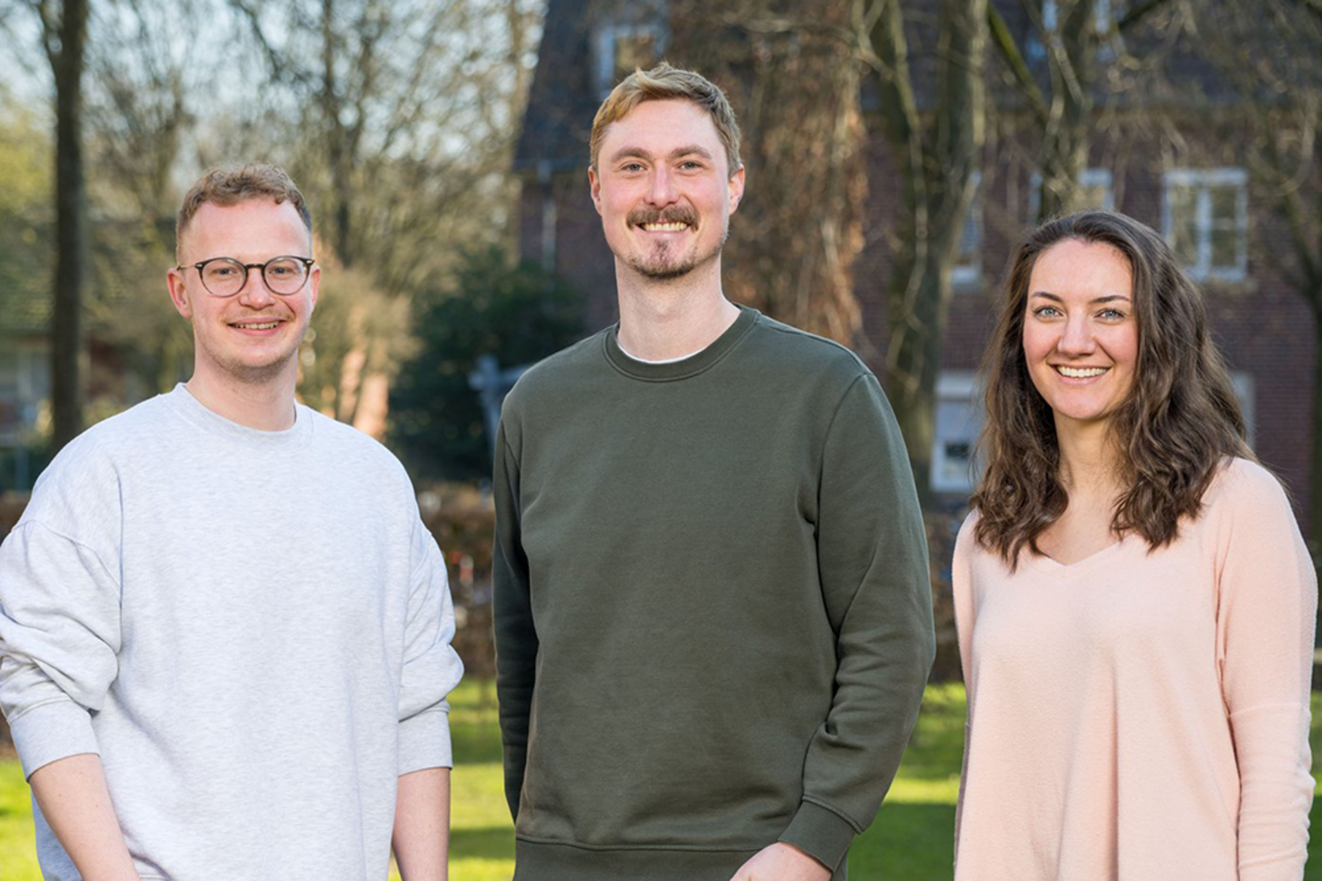UKM Pflege | Zwei Männer und eine Frau, die das Programm Quali4Care koordinieren.
